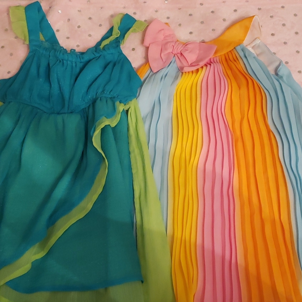 2 Sleeveless Formal Dresses
